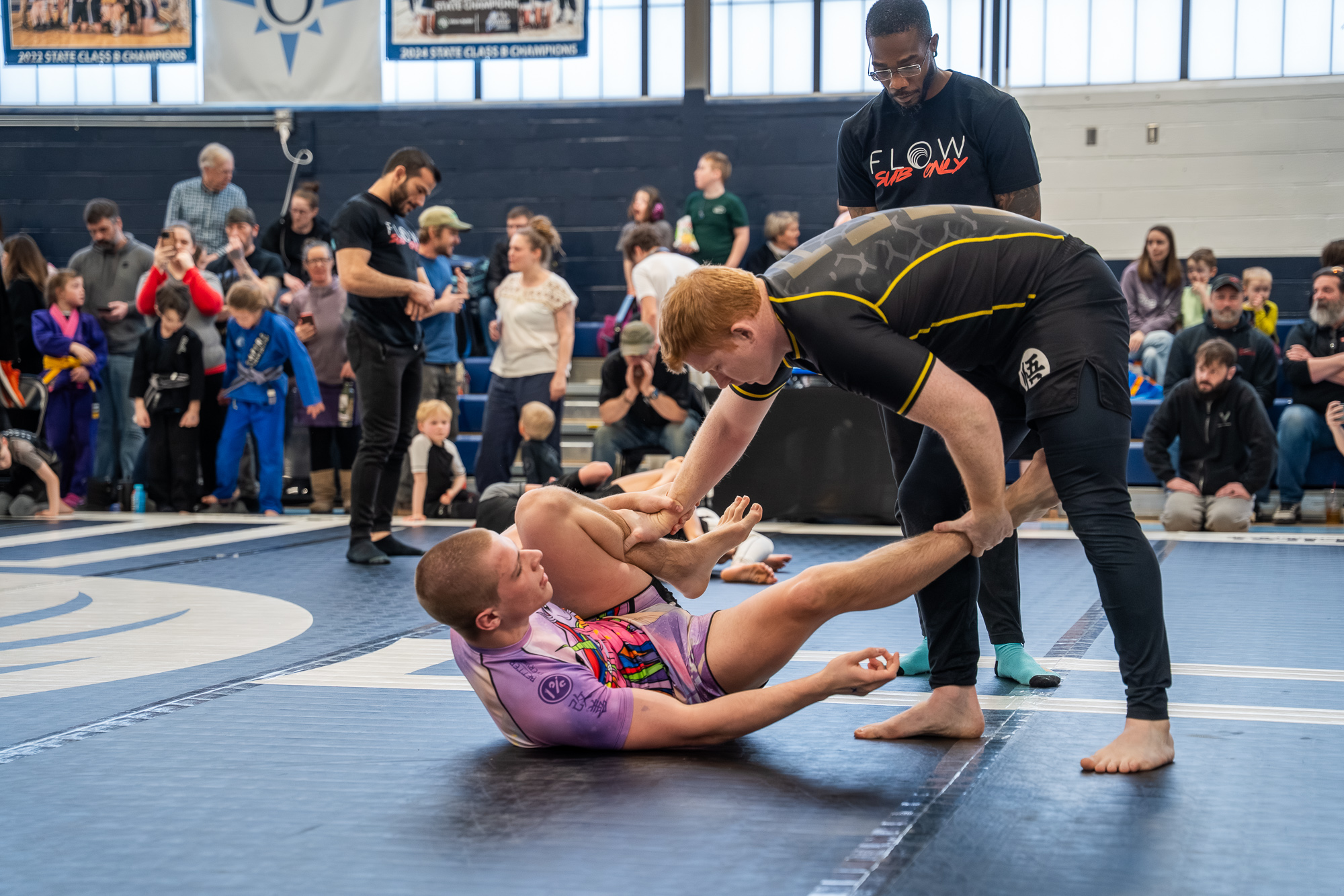 Flow Sub Only submission-only grappling match in front of a packed crowd